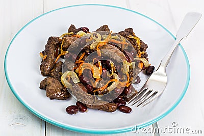 Beef liver, onions, carrots fried Stock Photo