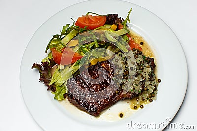 Beef medallion with vegetables and onions Stock Photo