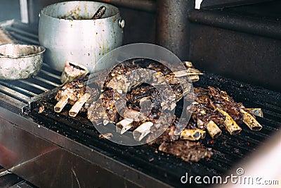 Beef spare rib with scorched BBQ on burn grille. Roasted with charcoal Stock Photo