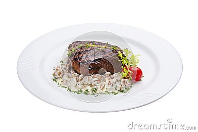 Beef steak with forest mushrooms. On a white plate Stock Photo