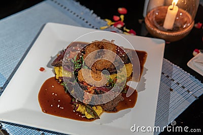 Beef Steak with Fried Onion Rings Stock Photo
