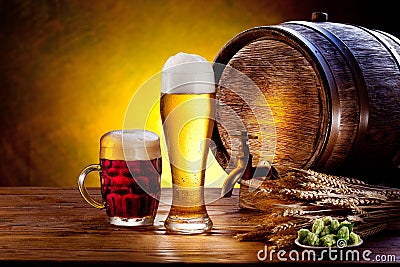 Beer barrel with beer glasses on a wooden table. Stock Photo