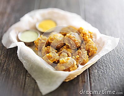 Beer battered mushrooms Stock Photo