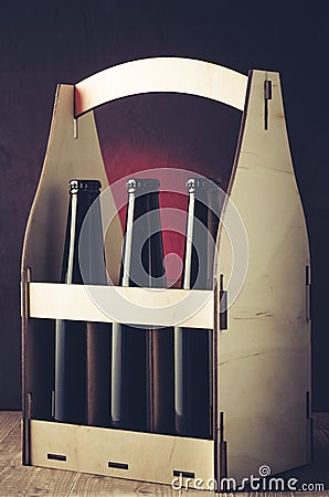 beer bottles case on wooden shelf/beer bottles case on wooden shelf. Selective focus Stock Photo