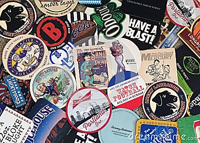 Beer coasters of many places Editorial Stock Photo