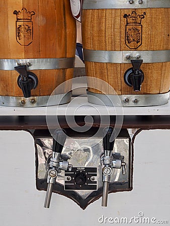 Beer dispenser with two wooden barrels Editorial Stock Photo