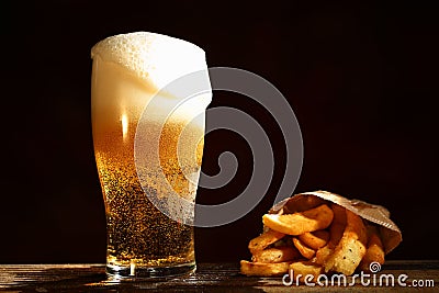 Beer and french fries Stock Photo