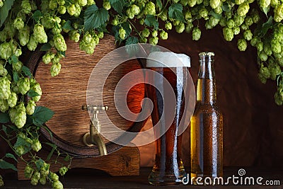 Beer glass and bottle with vintage beer barrel Stock Photo