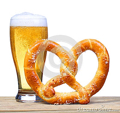 Beer Glass with German Pretzel on wooden table. isolated Stock Photo