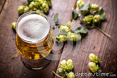 Beer into glass Stock Photo