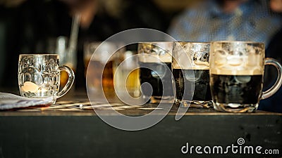 Beer glasses on the table of a bar Stock Photo