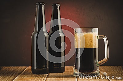 Beer mug and bottles on wooden shelf/Beer mug and bottles on woo Stock Photo