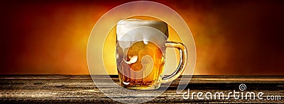 Beer in mug on table Stock Photo