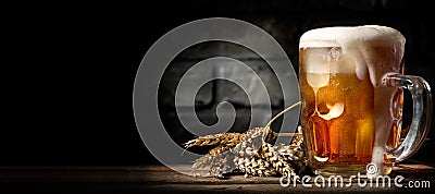 Beer in mug on table Stock Photo