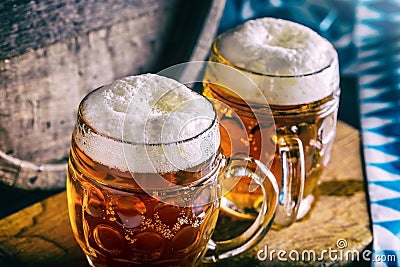 Beer. Oktoberfest.Two cold beers. Draft beer. Draft ale. Golden beer. Golden ale. Two gold beer with froth on top. Draft cold beer Stock Photo