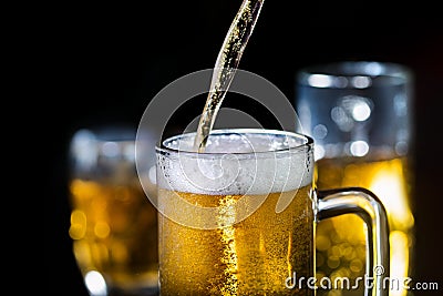 Beer pouring into glass, alcoholic drink Stock Photo