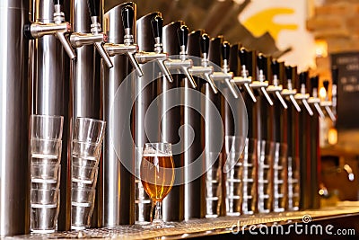 Beer pump in a beer bar Stock Photo