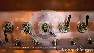 Beer sampling copper taps in old brewery, selective focus Stock Photo