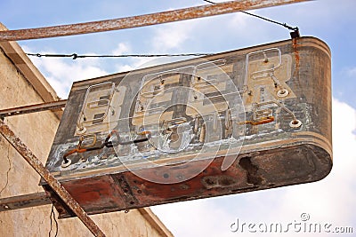 A beer sign marks the location of a long abandoned bar. Editorial Stock Photo