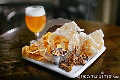 Beer With Snacks On Table In Pub Bar Stock Photo