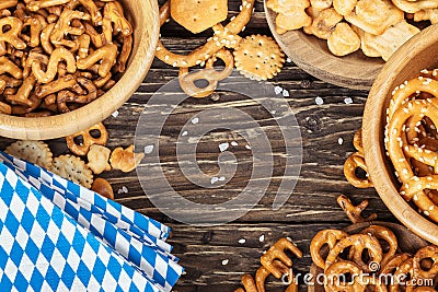 Beer snacks on a wooden table.Bavarian oktoberfest napkin. Top v Stock Photo