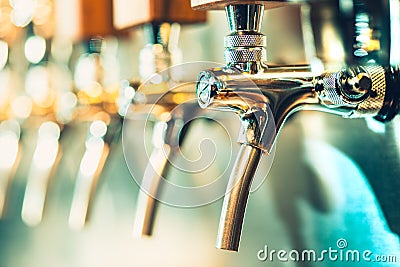 Beer taps in a pub Stock Photo