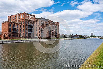 Beersel, Flemish Brabant Region, Belgium - An old mill house, now transformed into lofts and offices at the banks of the canal Editorial Stock Photo