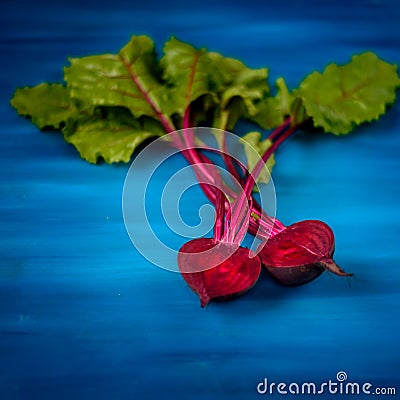Beet, beetroot bunch on blue wooden background. Copy space. Stock Photo