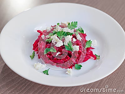 Beet salad with white cheese and parsley Stock Photo