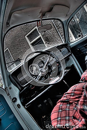 This beetle is parked in an old city called Elburg. Editorial Stock Photo