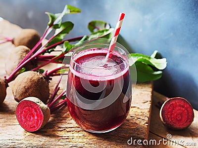 Beetroot juice in glass and fresh organics beetroot. Stock Photo