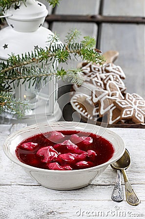 Beetroot red borsch with polish dumplings uszka Stock Photo