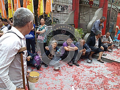 The beggars begging in front of the temple Editorial Stock Photo