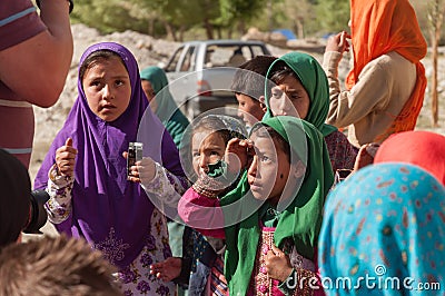 Beggars children begging for money from tourist in Ladakh India nature Editorial Stock Photo