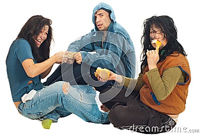 Beggars fight for food Stock Photo