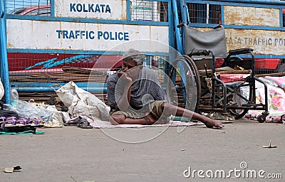 Beggars in front of Nirmal Hriday, Home for the Sick and Dying Destitutes in Kolkata Editorial Stock Photo