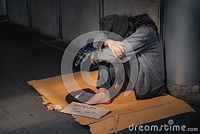 Beggars or homeless people need to help Stock Photo