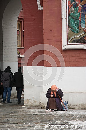 Begger in Moscow Kremlin Editorial Stock Photo