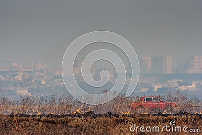 Beginning fire in the background of the city Stock Photo