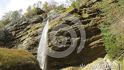 Behind Amazing Waterfall in Slovenian Alps Stock Photo