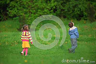 Behind kids looking upwards outdoor Stock Photo