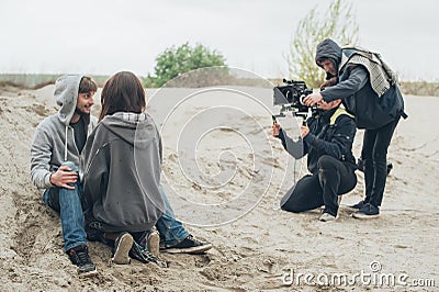 Behind the scene. Actor and actress in front of camera Stock Photo