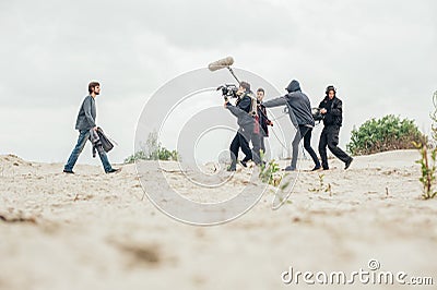 Behind the scene. Film crew filming movie scene outdoor Stock Photo