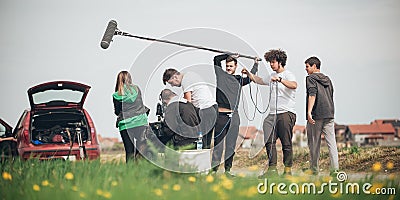 Behind the scene. Film crew filming movie scene outdoor Stock Photo