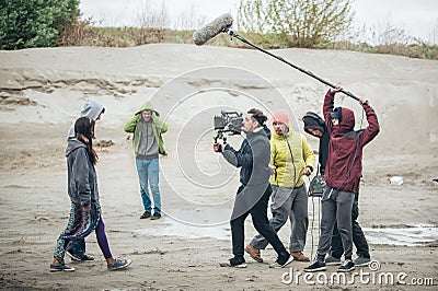 Behind the scene. Film crew filming movie scene outdoor Stock Photo