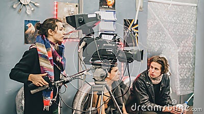 Behind the scene. Film crew filming movie scene in studio Stock Photo