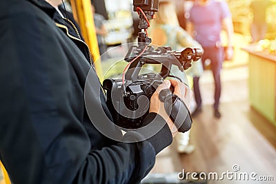 Behind the scenes of filming films or video products and the film crew of the film crew on the set in the pavilion of Stock Photo