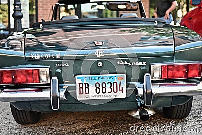 Behind shot of an old green sports car in Downers Grove, United States Editorial Stock Photo