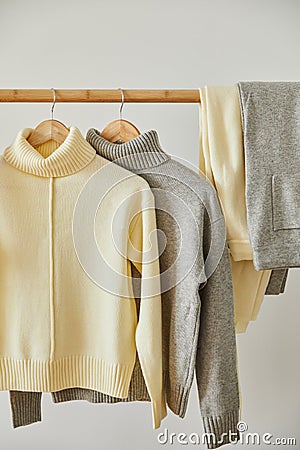 Beige and grey knitted soft sweaters Stock Photo