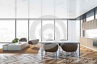 Beige kitchen and living room, side view Stock Photo